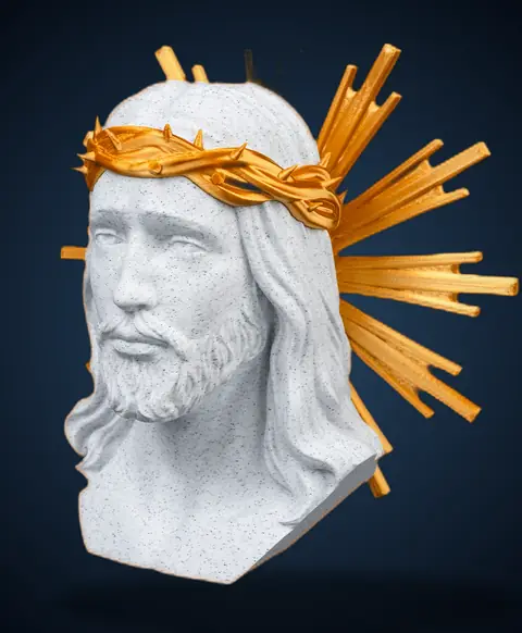Busto de Cristo em relevo visto em ângulo de três quartos.